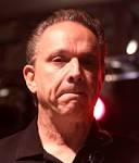 http://upload.wikimedia.org/wikipedia/commons/c/cc/Jimmie_Vaughan_by_Gage_Skidmore.jpg