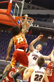 Mike Helms, Singapore Slingers, posterizes Justin Brown from the Perth Wildcats. Mike Helms, Singapore Slingers, posterizes Justin Brown from the Perth ... - pict0174