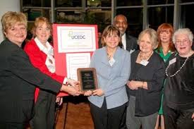 Gail Driscoll of Merck and Co. and Trustee of Union County Economic Development Corp (UCEDC) pre-sented an engraved plaque citing the Woodland Theater for ... - hanson-park-awardljpg-73d56b58c3138034_large