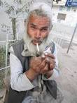 Old man smoking Photograph - Nasir Bilal - old-man-smoking-nasir-bilal