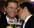 ... Michael Mronz gönnen sich ein Bier nach dem Wahlerfolg (c) Reuters - 1.557