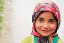 A little girl flashes an unforgettable smile while on a walk in Pahalgam, ... - 1