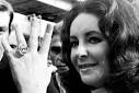 Why not spend it on a humongous diamond ring made famous by none other than ... - elizabeth-taylor-diamond-ring