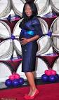 Angellica Bell looks blooming in purple as she joins husband