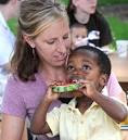 GRAND RAPIDS -- Speaking to a crowd of white adults, Ali Siraj, ... - g0823-ethiopia-adoptionjpg-d90a44038e2213c5_large