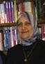 [View]. Alia Muhammad Baker infront of some of the books she saved - images?q=tbn:ANd9GcR5HboOqS-RO9qNd5LLC2sGkTDbMbWvzW7BlqyHgAasR8a3d8dpoL977Tg