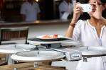 Drone waiters take trial flight at Timbre - Channel NewsAsia