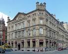 A typically grandiloquent stone-faced bank job. The Victoria Street facade - via Daymix