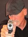 Dave Spaulding pointing gun