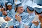 Columbia U janitor graduates, will keep cleaning - Houston Chronicle