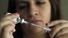 Judith Garcia, 19, fills a syringe as she prepares to give herself an ... - Diabetes-Teens_Webf-690x388