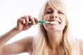 Dentist Samskar Bikram Rana of People´s Dental College & Hospital, ... - woman-brushing-teeth