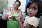 Lorena prepares ice cream as a
