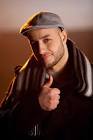 and Maher Zain is smiling.