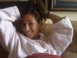Me in bed working.