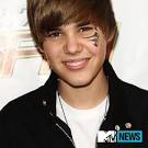 http://www.mtv.com/news/photos/b/bieber_justin_tattoo_100518/01_justin_bieber.jpg