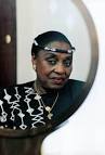 Miriam Makeba. Photo by Adam Bartos. You can try if you want, but it's hard ... - makeba01_body