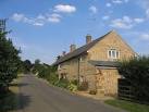 The Colony consists of several rows of cottages beside the road approaching - via Daymix