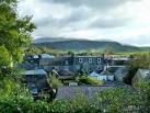 Cairnsmore of Fleet on the horizon shrouded in mist and low cloud. - via Daymix