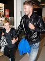 David and Brooklyn Beckham Touch Down – Moms &amp; Babies – Moms ...