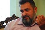 only is he a Romani imam,