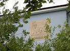 'Topping Out' by Michael Disley. A wall carving marks out the date - via Daymix