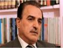 Minister Adnan al-Asadi