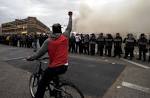 Public Emergency Declared After Baltimore Rioters Burn Police Cars.