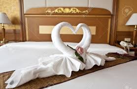 Honeymoon Bed Suite Decorated With Flowers And Towels Stock Photo ...