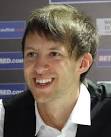 ... after suffering a surprise 10-3 defeat at the hands of Barry Hawkins. - Judd_Trump_Snooker_World_Championship_Happy_2012