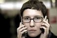 Toronto resident Gabriella Nagy is suing Rogers Wireless Inc. for $600000 ... - woman-with-two-cell-phones-300x200