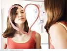 girl looking in mirror image