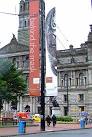 Two Philadelphia Police SWAT members stroll across George Square, - via Daymix