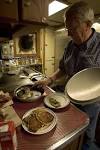 Chef prepares dinner in the - via Daymix