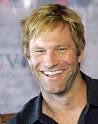 http://static.moviefanatic.com/images/gallery/aaron-eckhart-photo.jpg