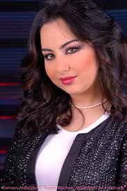 Suhair al-Qaisi (ineedunowlol) Tags: woman beautiful television iraqi presenter anchorwoman - 4481765860_fef853ef9b_m