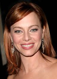 Melinda Clarke&#39;s side-swept bangs are a sweet touch on this simple style. What to do: 1. To get this look, apply a straightening cream then part hair deeply ... - melinda-clarke-bob-blunt-red