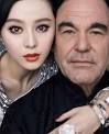 poses with Chinese actress