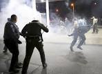 CCTV shows Antonio Martin appears to point gun at St Louis cop.