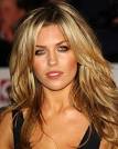 Abbey Clancy, donning her