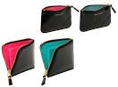 http://www.highsnobiety.com/news/wp-content/uploads/2009/02/comme-des-garcons-glossy-black-wallets-front.jpg