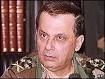 General Michel Aoun in 1991. Mr Aoun says he wants to unify Lebanon and end ... - _40618954_ap_aoun_old203