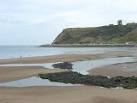 with the castle on the headland that separates Scarborough's two bays. - via Daymix