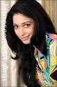 South Indian actress Tamannaah Bhatia poses during a photo shoot with the ... - Tamannaah-Bhatia