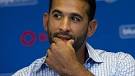 Blue Jays slugger Jose Bautista listens to questions from the media during a ... - bautista-jose_584