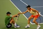 File:Martina give Bob Bryan a hand.jpg - Wikipedia, the free ...