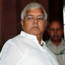 Lalu Prasad says Giriraj Singhs face should be blackened over.