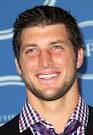 NFL player Tim Tebow poses in