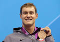 Former Michigan swimmer Peter Vanderkaay poses with the Olympic bronze medal ... - Vanderkaay_Bronze-thumb-350x246-118219