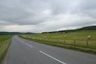 NH9424 : The A938 curves to the right round Duthil in the distance - via Daymix